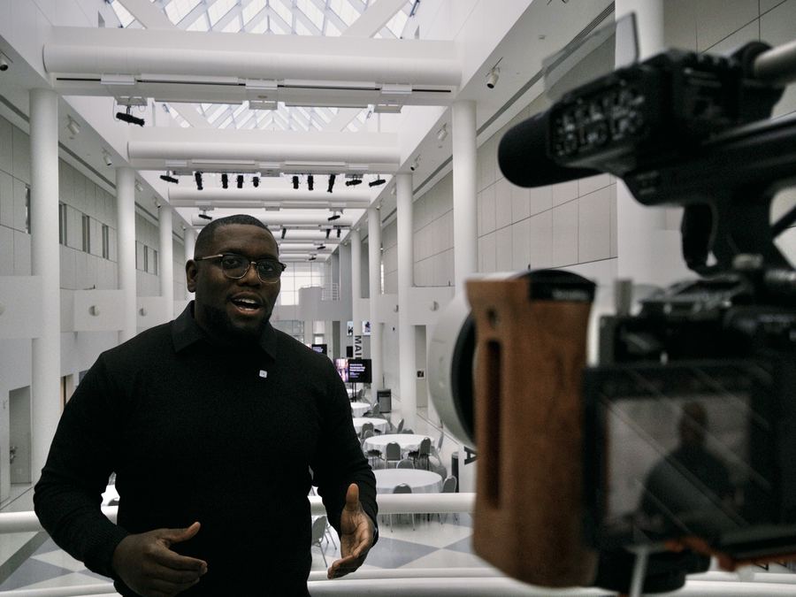 Sly Gittens being filmed for video interview